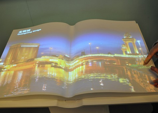 電?翻書、空中翻書、感應(yīng)翻書、互動翻書、虛擬翻書在汽車官、婚紗影樓等商業(yè)場所的應(yīng)用場景